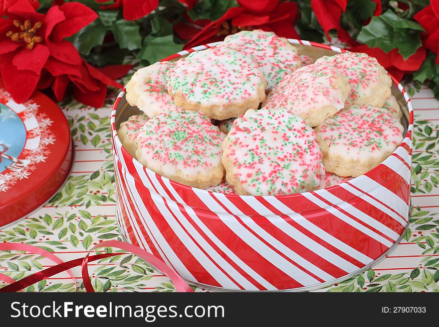 Christmas shortbread sugar cookies in a red and white tin