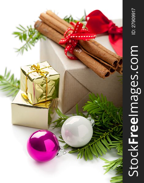 Christmas composition with baubles and gift boxes, on white