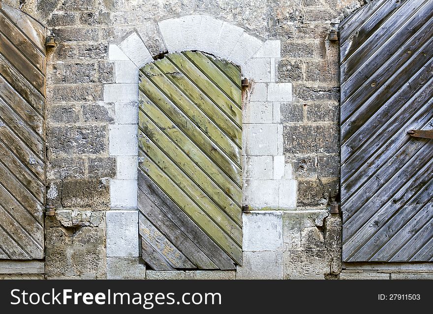 Old doors in brick wall,(17 century), old Riga. Old doors in brick wall,(17 century), old Riga