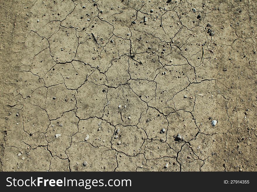 Cracked earth in the deep drought and scorching heat of the summer of 2012