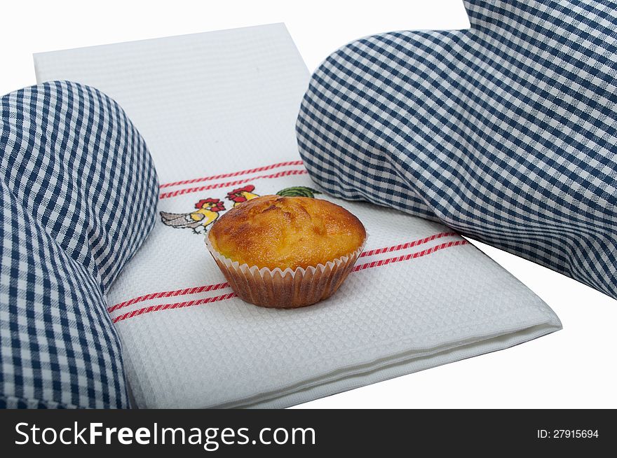 Muffins with gloves on a white backgroud