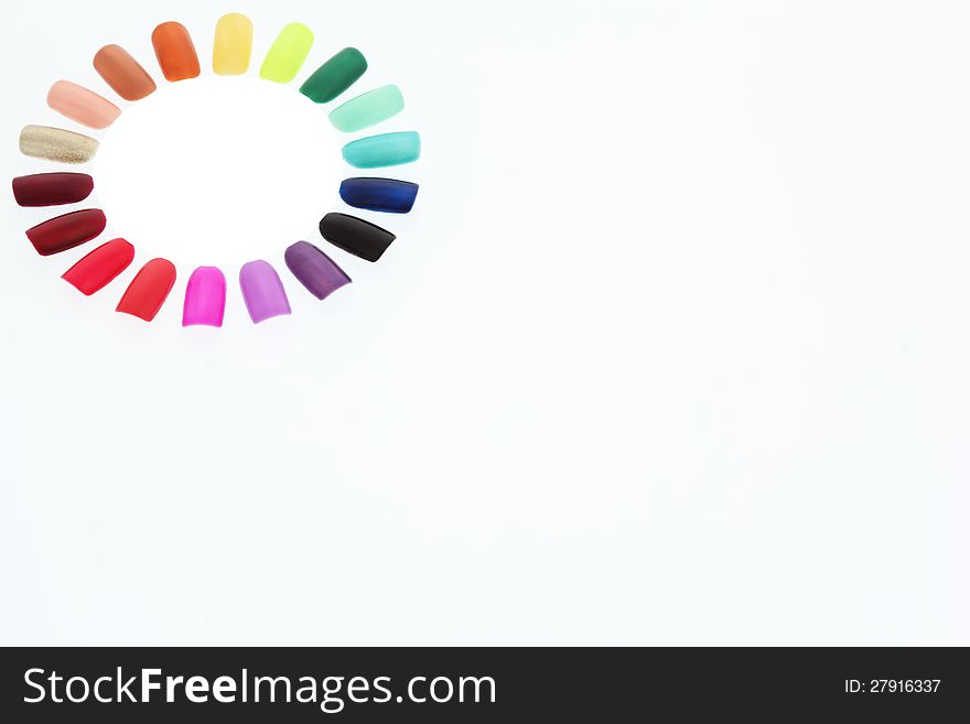 Nail polish rainbow on white background