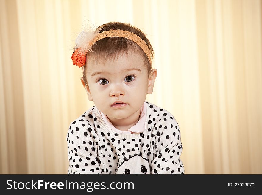 White infant girl posing in studio. White infant girl posing in studio