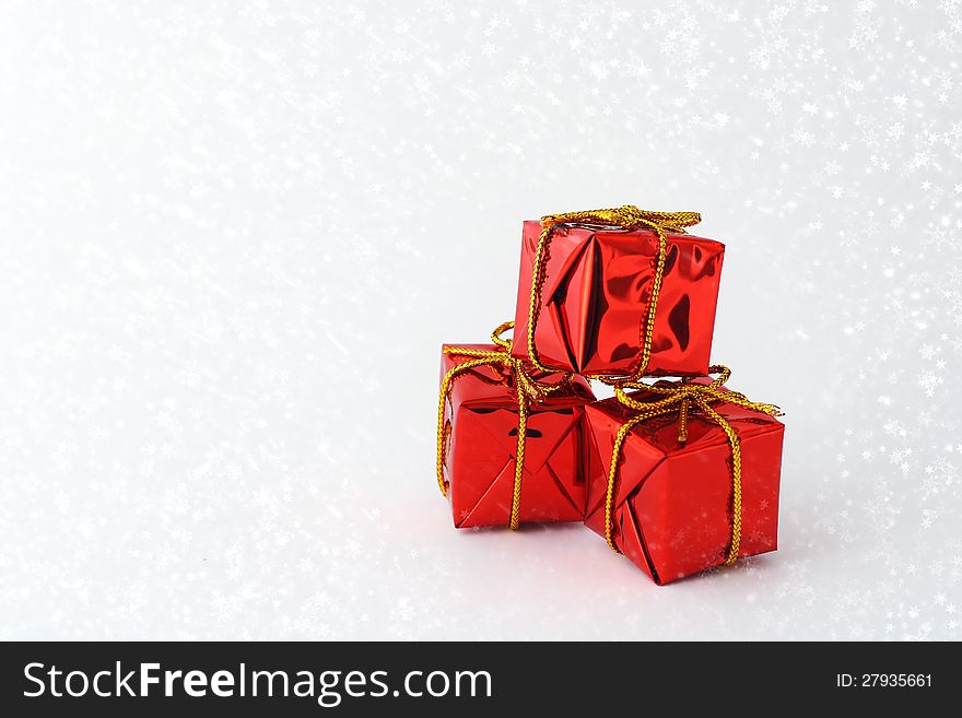 Gift boxes in snow and with decoration. Gift boxes in snow and with decoration.