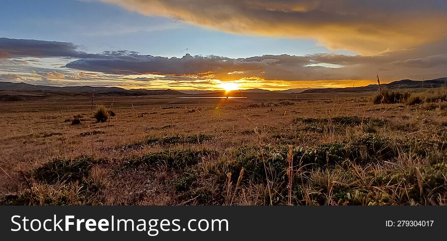 Sunset Over The Mountains Of The Peruvian Andes.