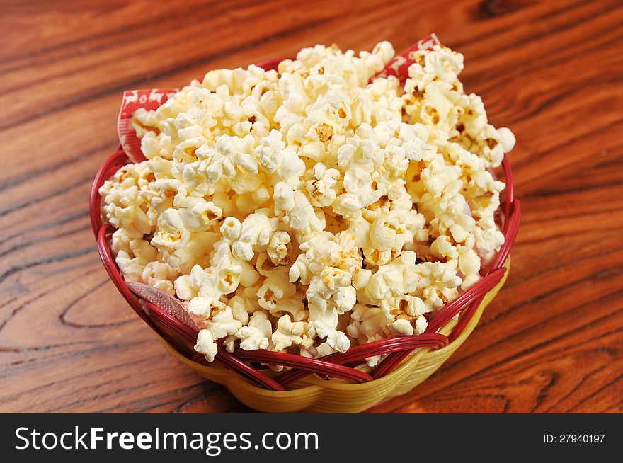 A bag of popcorn   on the table