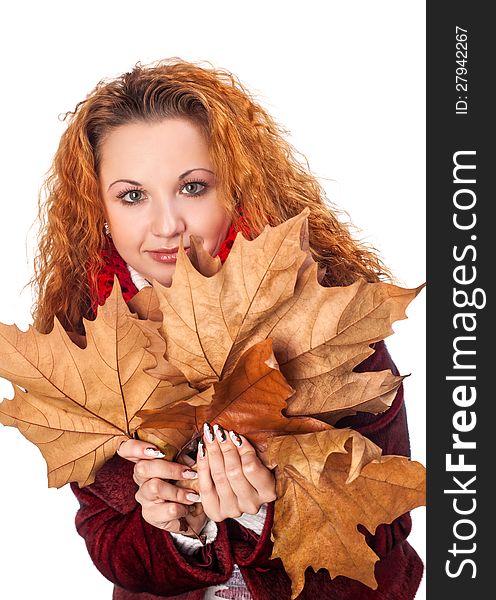 Girl with yellow autumn leaves