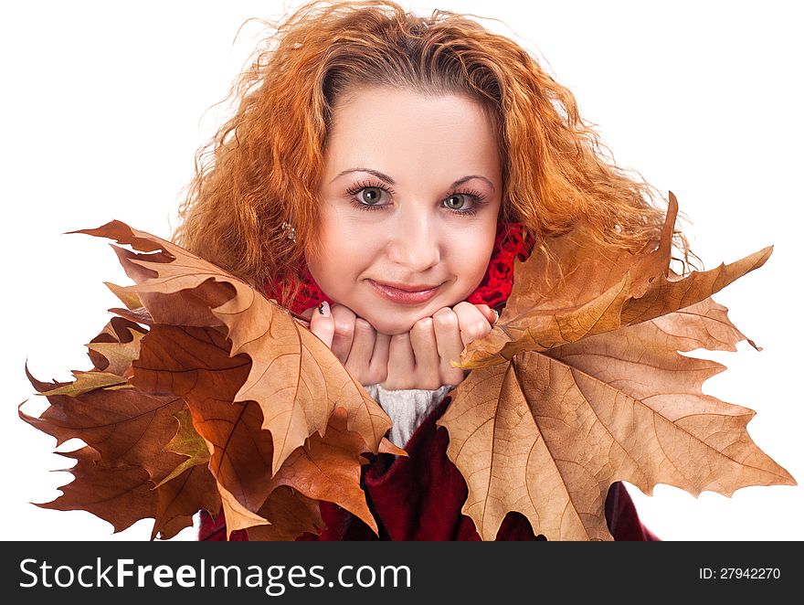 Redhead girl with dry autumn leaves. Redhead girl with dry autumn leaves