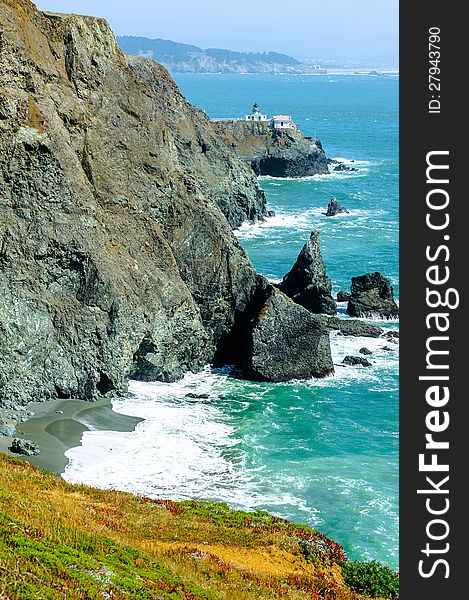 Meadow, ocean and lighthouse view. Meadow, ocean and lighthouse view