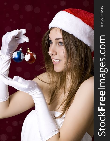 Beautiful woman with christmass toys