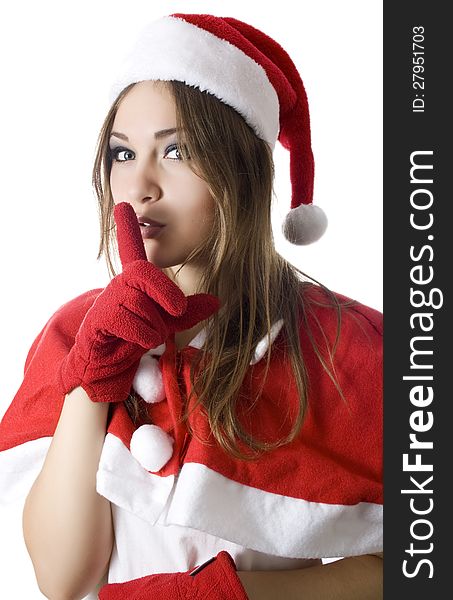 Young happy girl in Christmas hat.