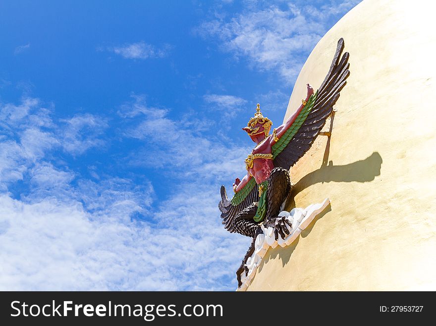 Garuda, the mythical bird, on a Golden Cheddi at a temple in the Samut Prakan province of Thailand.