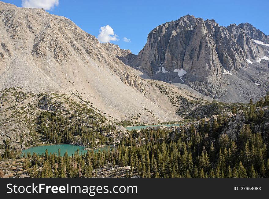 A view of glacial-fed First Lake and Second Lake in the Big Pines Lakes area of the John Muir Wilderness of California&#x27;s Eastern Sierra. A view of glacial-fed First Lake and Second Lake in the Big Pines Lakes area of the John Muir Wilderness of California&#x27;s Eastern Sierra.