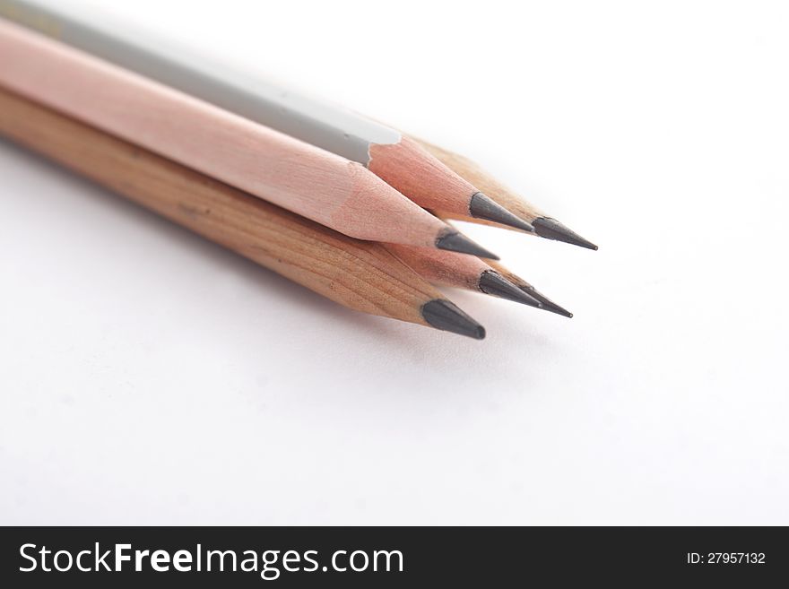 Four wooden pencil, on white background, with soft shadow. Four wooden pencil, on white background, with soft shadow