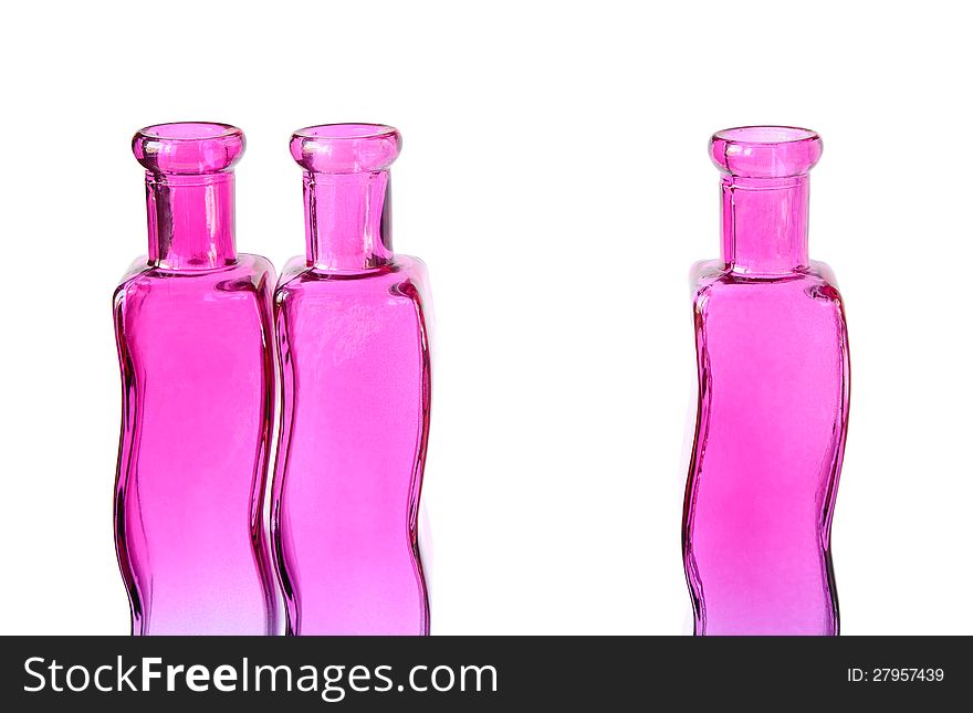 Three glass vases on a white background