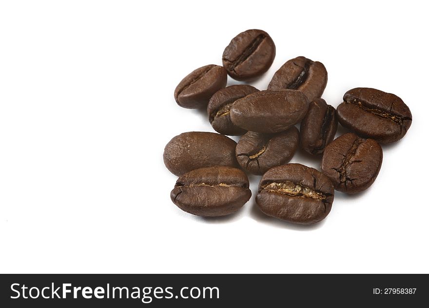 Close-up of coffee beans isolated on a white background