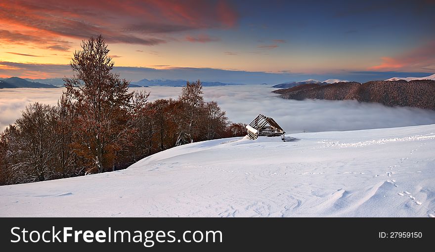 Morning landscape in the mountains with ruined house