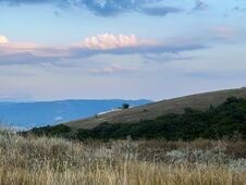 Steppe Hills. Evening Sky. A Mountain On The Horizon. Summer Sunset. Royalty Free Stock Images