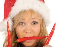 Attractive Woman In Santa Cap With Chili Pepper Stock Photography Attractive Woman In Santa Cap With Chili Pepper Stock Photography