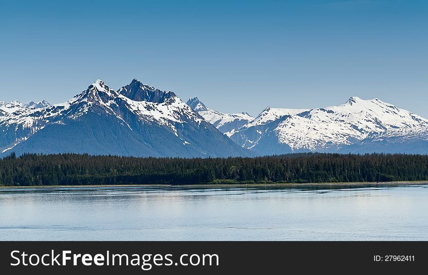 Along the Inside Passage, Alaska's mountain range and forestry. Along the Inside Passage, Alaska's mountain range and forestry.