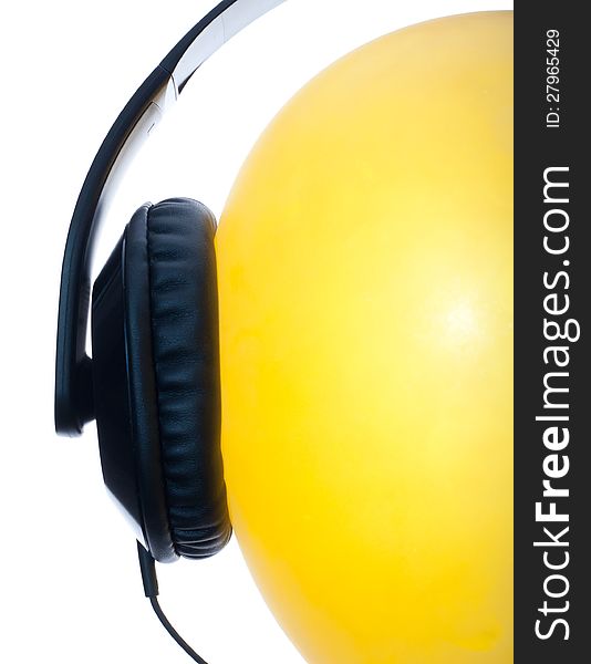 Funny headset on the yellow balloon isolated. Funny headset on the yellow balloon isolated