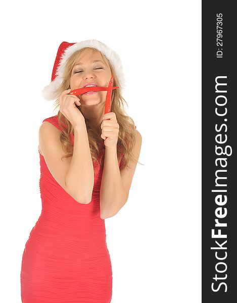 Attractive woman in Santa Cap with chili pepper