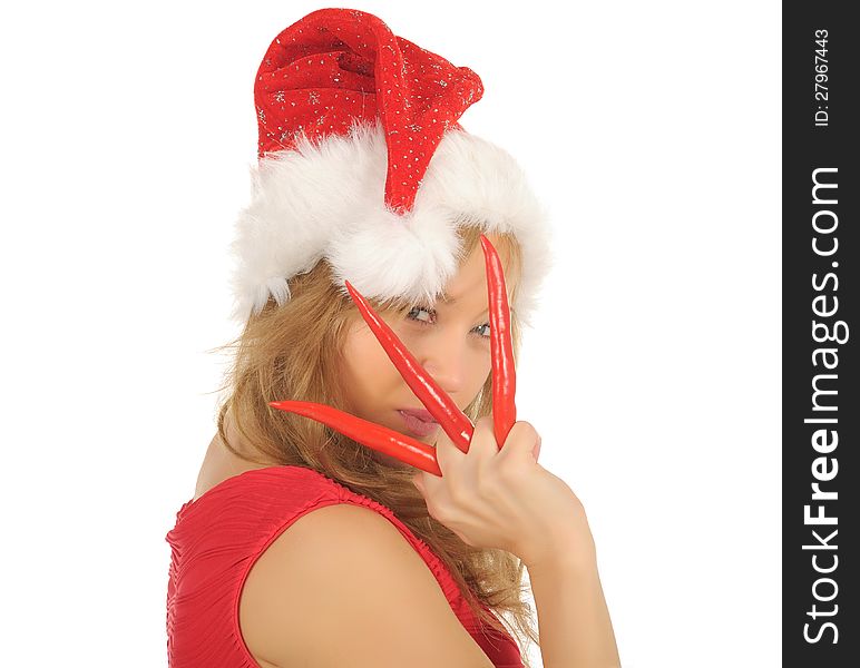 Attractive woman in Santa Cap with chili pepper