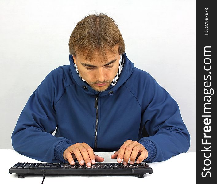 Man in front of the keyboard