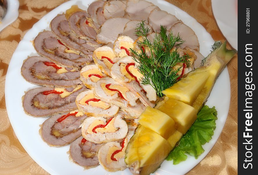 Slices Of Meat Decorated With Greens