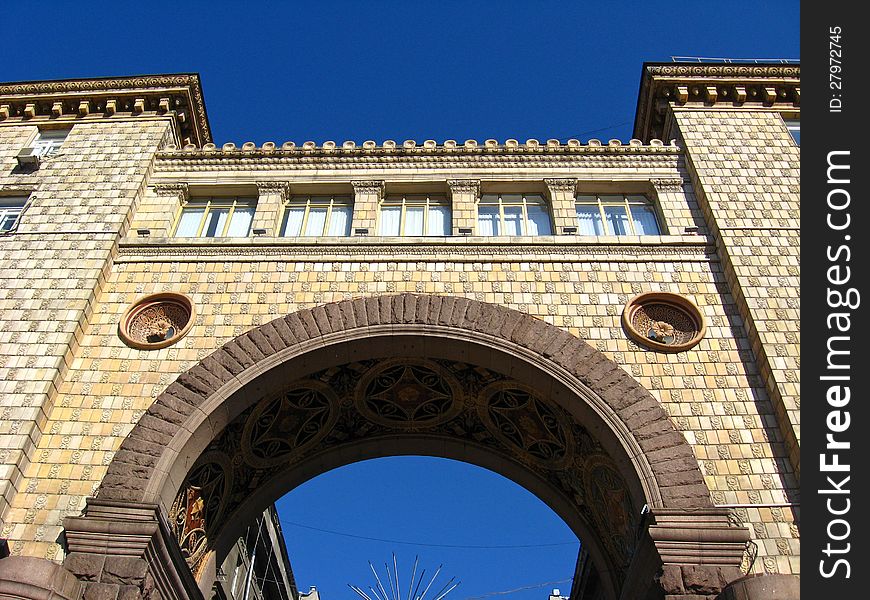 Image of beautiful arch on a background of the blue sky in Kiev
