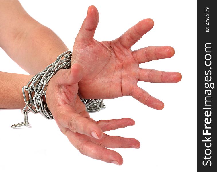 Hands in chains. Hands reaching for freedom. Hands in chains. Hands reaching for freedom