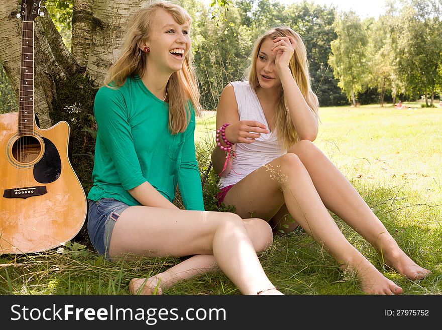 Two girls are having fun in the summer sun. Two girls are having fun in the summer sun