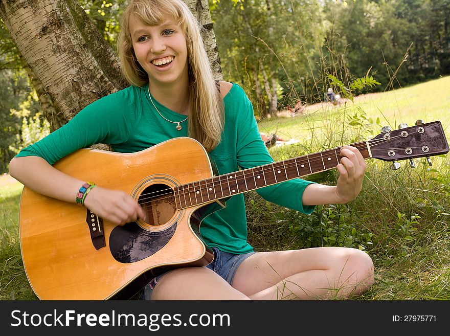 Blond Girl And Her Instrument