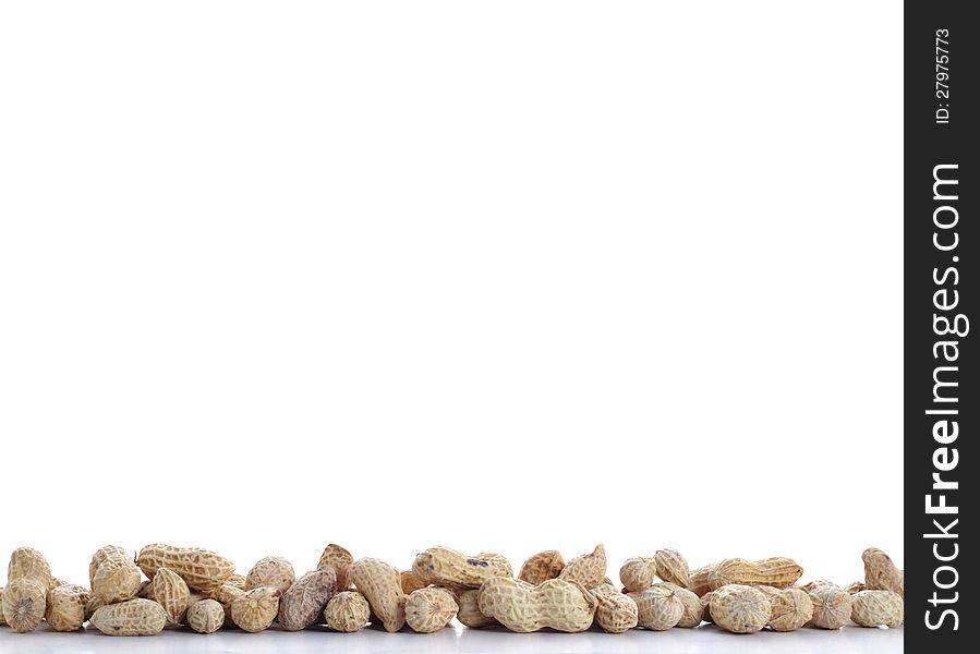 Inside of peanuts on white background with reflection