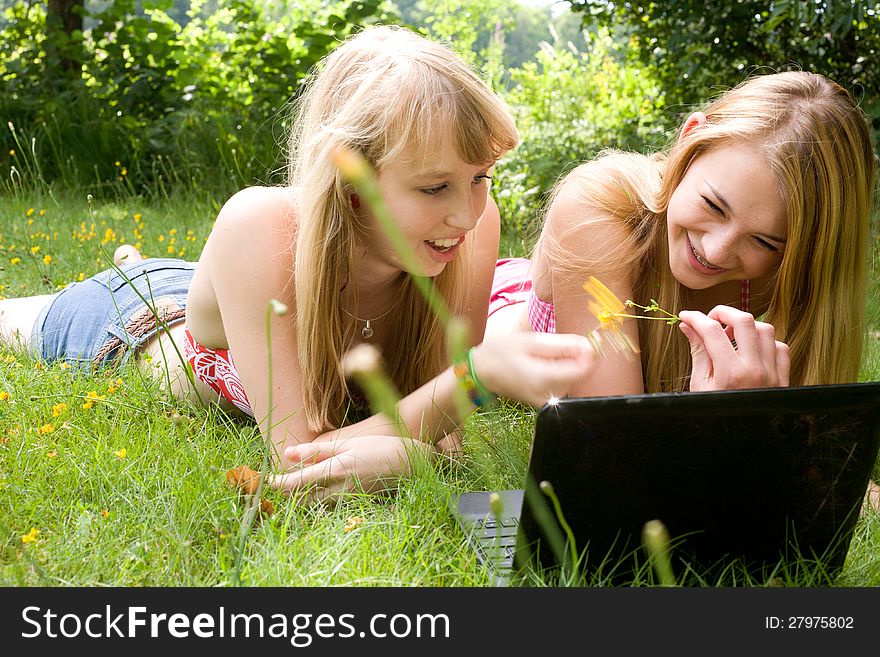 Two girls are having fun in the summer sun. Two girls are having fun in the summer sun