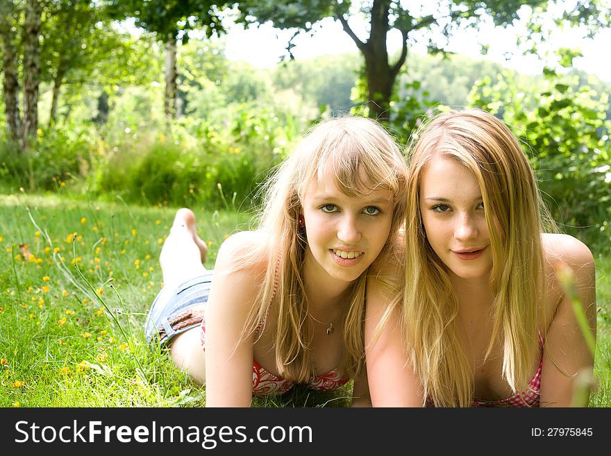 Two girls are having fun in the summer sun. Two girls are having fun in the summer sun