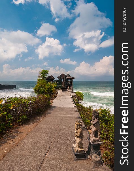 Pura Batu Bolong - small hindu temple near Tanah Lot, Bali, Indonesia. Pura Batu Bolong - small hindu temple near Tanah Lot, Bali, Indonesia