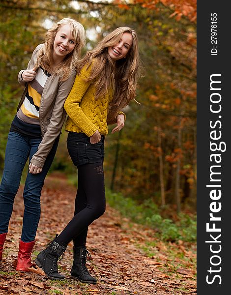 Smiling teenagers in the forest