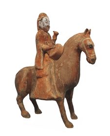 Ancient Man On Horse Statue Isolated. Stock Images Ancient Man On Horse Statue Isolated. Stock Images