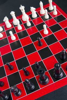 Chess Game Pieces Board Red White Black Background Royalty Free Stock Photography Chess Game Pieces Board Red White Black Background Royalty Free Stock Photography