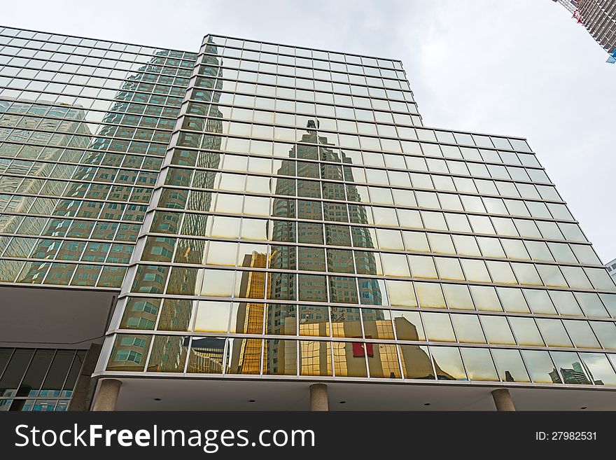 Toronto skyscrapers reflection on glass windows on Bay st. Toronto skyscrapers reflection on glass windows on Bay st