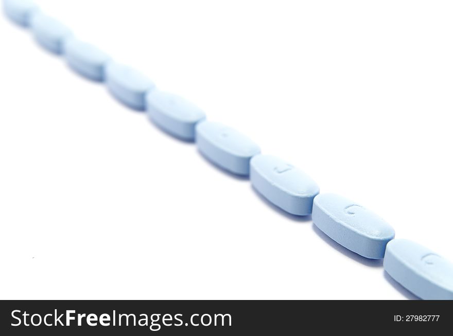 Picture of  pills on white isolated background.