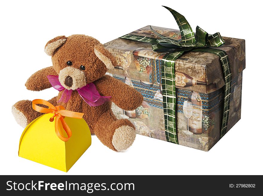 Teddy bear with a cardboard gift box