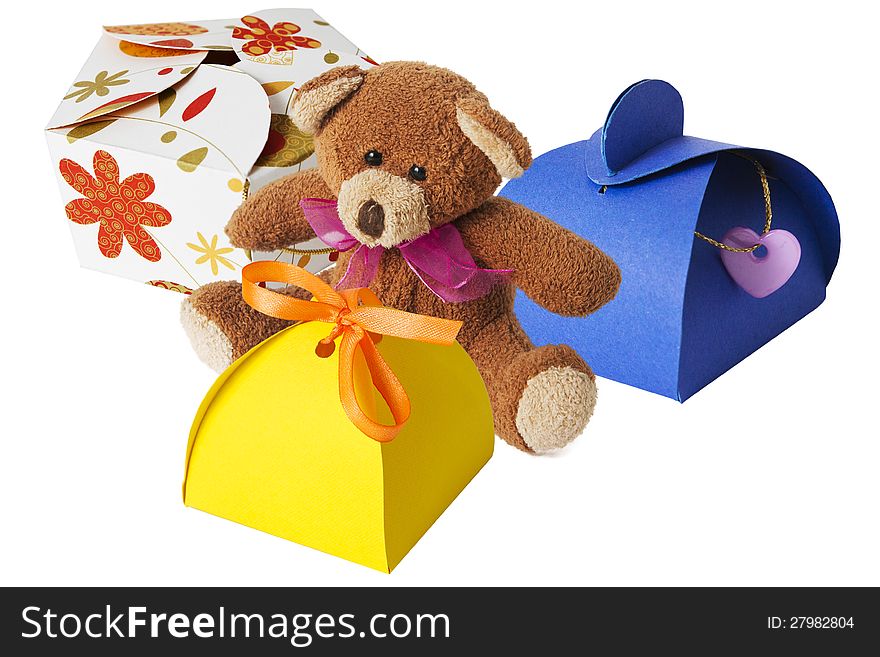 Teddy bear with a cardboard gift box