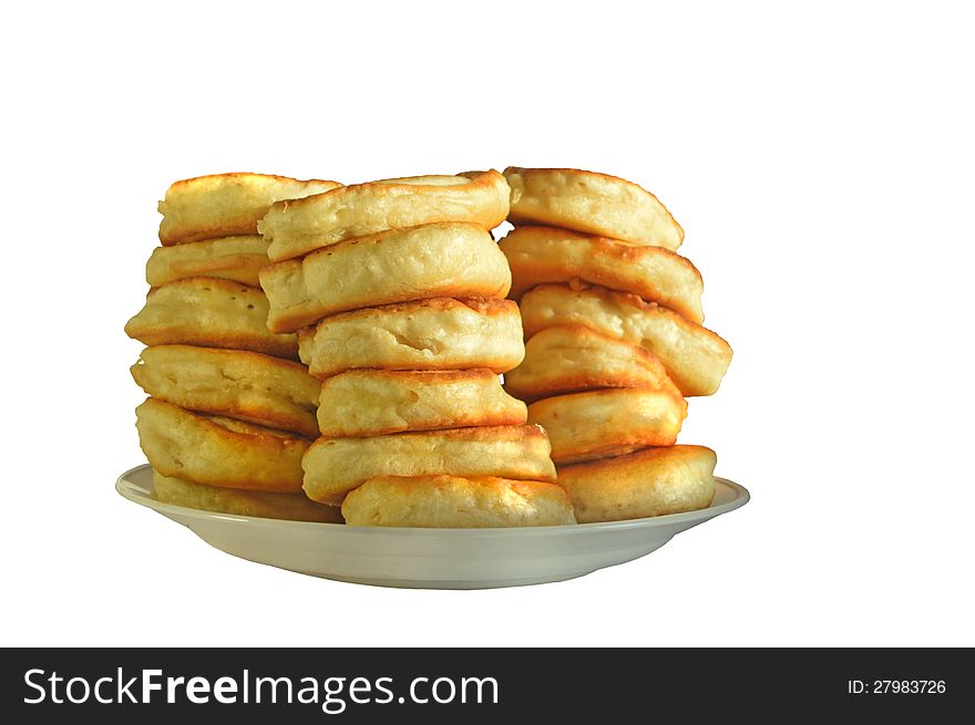 The heap of fresh pancakes on the white background