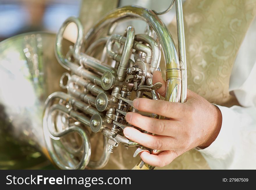 Detail close up of French Horn musical instrument, part of the Brass family of instruments