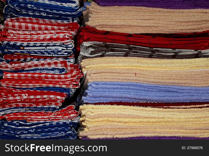 Colorful towels folded and stacked