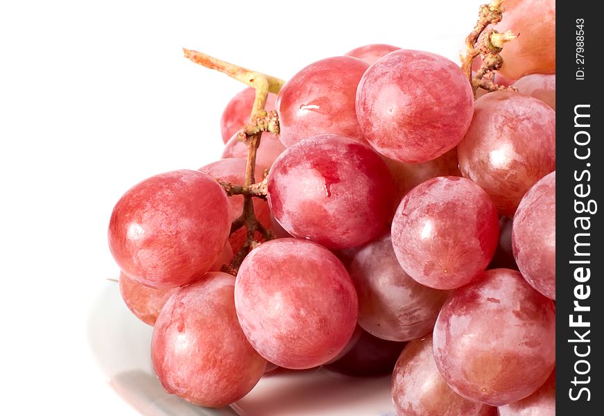 Fresh purple grape on white background