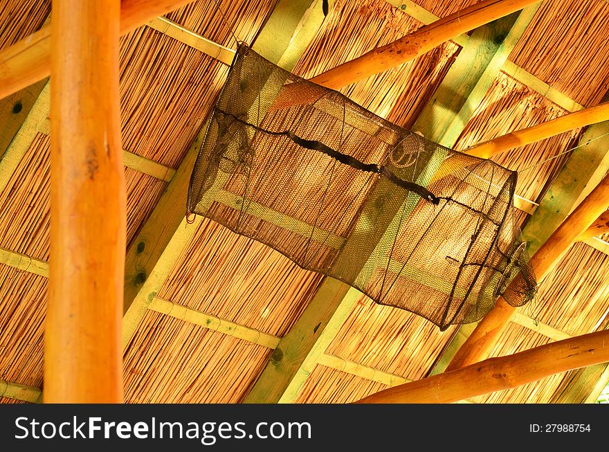 Photo of a fishnet in a fishing hut