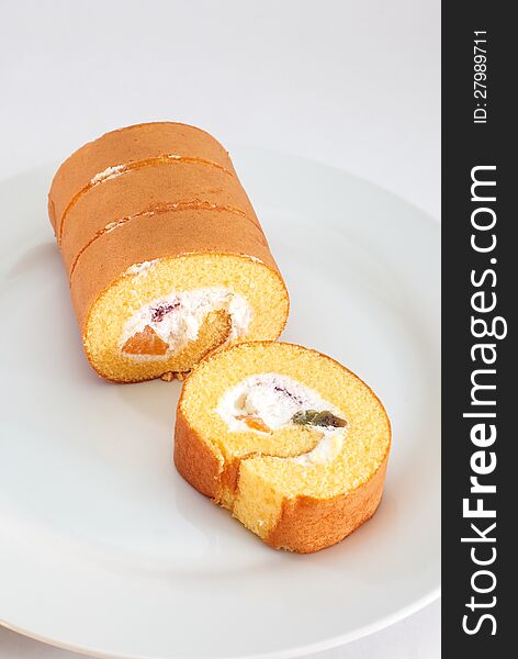 Roll cake on white background